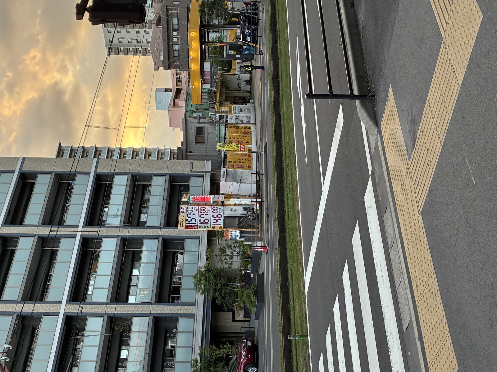 エコスタンド 工学部前店／（有）はーもにーりんぐ社の価格看板の写真1